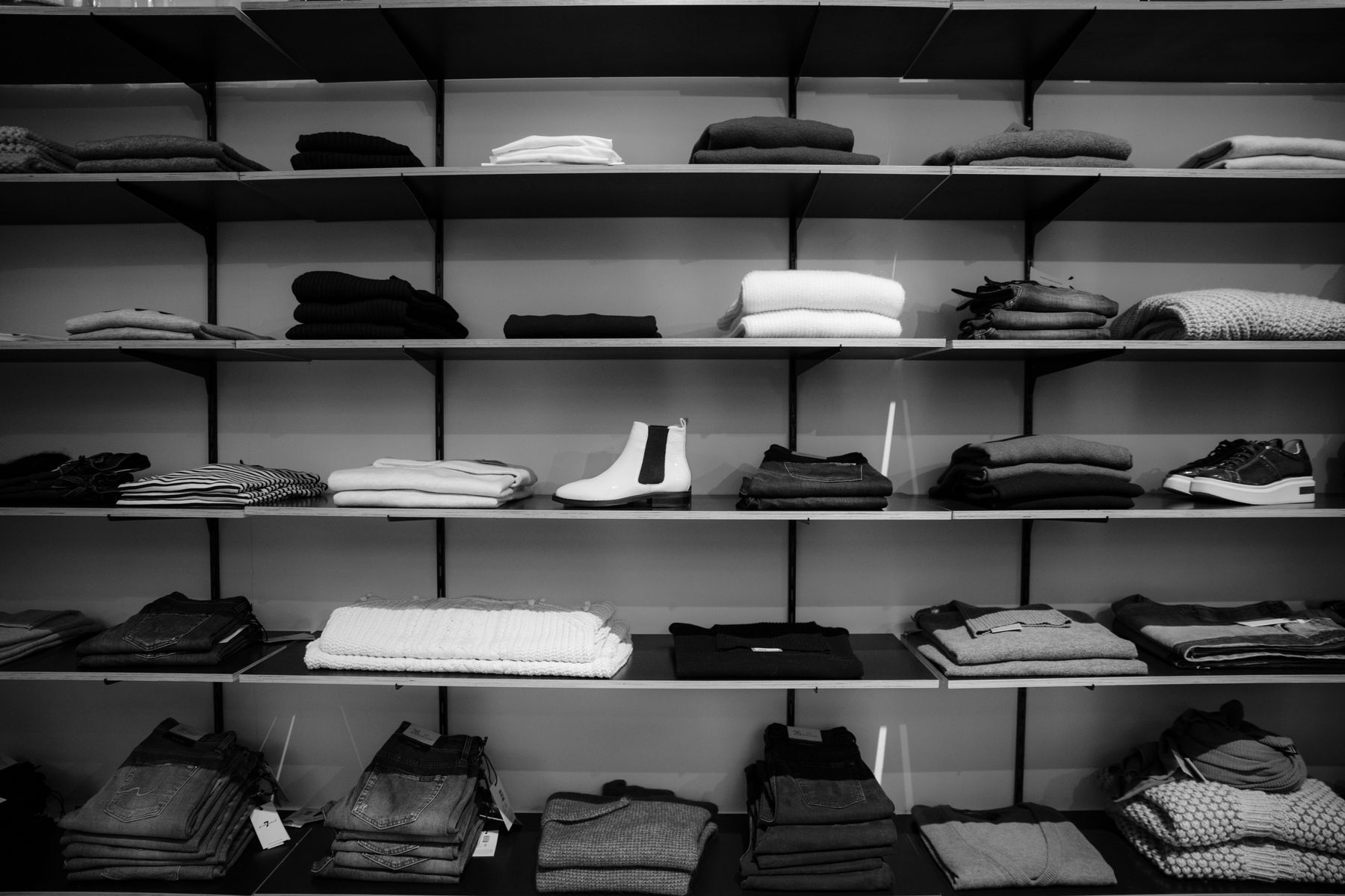 Clothing displayed on shop shelves, used for the Zunada webshop.